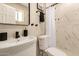 Modern bathroom featuring sleek fixtures, stylish tiles, and a walk-in shower at 3302 N 40Th Dr, Phoenix, AZ 85019