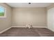 Spacious bedroom featuring carpet flooring and a large window at 3302 N 40Th Dr, Phoenix, AZ 85019