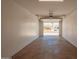 The garage is a good size with an open door showing the street at 3302 N 40Th Dr, Phoenix, AZ 85019