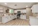 Updated kitchen featuring white cabinets, stainless steel appliances, and stylish decor at 3302 N 40Th Dr, Phoenix, AZ 85019