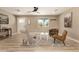 Bright and inviting living room with modern decor, wood flooring, ceiling fan, and neutral color palette at 3302 N 40Th Dr, Phoenix, AZ 85019