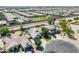 Beautiful aerial view showcasing a neighborhood with well-maintained homes and lush landscaping at 34970 N Spur Cir, San Tan Valley, AZ 85144