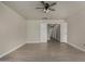 Bedroom showing the neutral decor and access to hallway and other rooms at 34970 N Spur Cir, San Tan Valley, AZ 85144