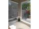 Bright bathroom with a tub, tile floor, and natural light at 351 S Apache Dr, Chandler, AZ 85224