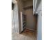 Walk-in closet featuring shelving and rod for ample storage space at 351 S Apache Dr, Chandler, AZ 85224