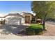 Charming single-story home featuring a well-maintained lawn and desert landscaping at 351 S Apache Dr, Chandler, AZ 85224