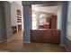 Open-concept living area with views of the kitchen, fireplace, and access to the backyard at 351 S Apache Dr, Chandler, AZ 85224