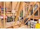 Spacious attic storage with wooden beams, offering ample room for organization and convenience at 3823 E Kroll Dr, Gilbert, AZ 85234