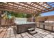 Backyard with private hot tub and grill area, perfect for outdoor entertaining at 3823 E Kroll Dr, Gilbert, AZ 85234