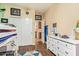 Bright bedroom features hardwood floors, closet, dresser, and lots of natural light at 3823 E Kroll Dr, Gilbert, AZ 85234