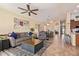 Cozy living room featuring stylish decor, comfortable seating, and an open layout to the dining area at 3823 E Kroll Dr, Gilbert, AZ 85234