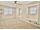 Bedroom with playful wall decor, carpet, and built-in window seats at 4002 E Agave Rd, Phoenix, AZ 85044