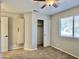 Bedroom featuring a wardrobe cabinet, carpeted floors, and a sliding door closet at 4002 E Agave Rd, Phoenix, AZ 85044