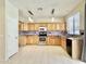 Modern kitchen with granite countertops, stainless steel appliances, and ample cabinet space at 4002 E Agave Rd, Phoenix, AZ 85044