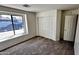 Bright bedroom with great window view, closet and fresh carpet creates an inviting and restful space at 43890 W Bedford Dr, Maricopa, AZ 85138