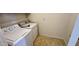 Laundry room with washer and dryer offers convenience and functionality at 43890 W Bedford Dr, Maricopa, AZ 85138