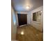 Bedroom featuring light-colored walls, tile floor, and a window with a shutter at 440 S Parkcrest -- # 22, Mesa, AZ 85206