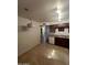 Updated kitchen featuring dark wood cabinets, dishwasher, and stainless steel sink at 440 S Parkcrest -- # 22, Mesa, AZ 85206