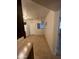 Bright kitchen with white appliances, dark wood cabinets, and tile floors at 440 S Parkcrest -- # 22, Mesa, AZ 85206