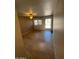 Spacious living room with ceiling fan and sliding glass door to a covered patio at 440 S Parkcrest -- # 22, Mesa, AZ 85206