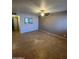 Living room featuring tile floors, neutral paint, ceiling fan, and natural light at 440 S Parkcrest -- # 22, Mesa, AZ 85206