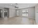 Bright living room featuring wood-look floors and neutral paint, ceiling fan at 4441 N 27Th Dr, Phoenix, AZ 85017