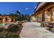 Outdoor living at its finest with a large patio, inviting pool, and string lights for magical evenings at 4610 E Meadowview Dr, Gilbert, AZ 85298