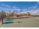 Well-maintained basketball court with recreational facilities and a beautiful sky at 4610 E Meadowview Dr, Gilbert, AZ 85298