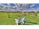 Inviting outdoor space with comfortable seating, lush green landscaping, and mountain views at 4610 E Meadowview Dr, Gilbert, AZ 85298