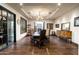 Dining room features modern chandelier and doors to patio at 4610 E Meadowview Dr, Gilbert, AZ 85298