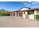 Spacious home featuring a three-car garage and a beautiful paver driveway at 4610 E Meadowview Dr, Gilbert, AZ 85298