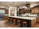 Kitchen features large center island with bar stool seating at 4610 E Meadowview Dr, Gilbert, AZ 85298
