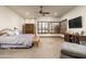 Expansive main bedroom with coffered ceiling, ceiling fan, natural light, and spacious layout at 4610 E Meadowview Dr, Gilbert, AZ 85298