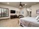 Main bedroom features plantation shutters and sitting area at 4610 E Meadowview Dr, Gilbert, AZ 85298