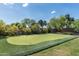 Well-maintained backyard putting green, perfect for golf enthusiasts at 4610 E Meadowview Dr, Gilbert, AZ 85298