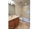 Bathroom featuring a single sink vanity, toilet, and a shower-tub combination at 5345 W Marcus Dr, Phoenix, AZ 85083