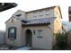 Charming two-story home featuring an arched entryway, tile roof, and neutral stucco exterior at 5345 W Marcus Dr, Phoenix, AZ 85083