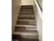 Beautiful staircase featuring wood steps and a white banister at 5345 W Marcus Dr, Phoenix, AZ 85083