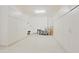 The garage has ample space and is lined with cabinets for storage at 5614 W Saint Moritz Ln, Glendale, AZ 85306