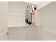 Walk-in closet with a rod for hanging clothes with shelving above and below at 5614 W Saint Moritz Ln, Glendale, AZ 85306