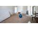 Unfurnished bedroom features carpet flooring, neutral walls, and plenty of natural light at 6128 W Columbine Dr, Glendale, AZ 85304