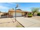 Welcoming single-Gathering home featuring an attached garage and a well-kept front yard at 6128 W Columbine Dr, Glendale, AZ 85304