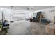 Two car garage with door and ample room for storage at 6128 W Columbine Dr, Glendale, AZ 85304