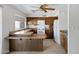 Functional kitchen featuring classic wood cabinets and bright natural light from the window at 6128 W Columbine Dr, Glendale, AZ 85304