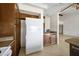 Spacious kitchen featuring ample storage and counter space and a large refrigerator at 6128 W Columbine Dr, Glendale, AZ 85304