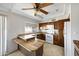 Cozy kitchen with a breakfast bar area, white appliances, and generous cabinet space at 6128 W Columbine Dr, Glendale, AZ 85304