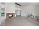 Bright and airy living room featuring a fireplace, tile floors, and beams at 6128 W Columbine Dr, Glendale, AZ 85304