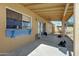 Covered patio with blue trim and a view of the backyard at 6128 W Columbine Dr, Glendale, AZ 85304