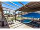 Backyard featuring workout equipment, a covered patio and a play area at 6814 W Berkeley Rd, Phoenix, AZ 85035