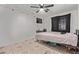 Bedroom with ceiling fan and tile flooring at 6814 W Berkeley Rd, Phoenix, AZ 85035